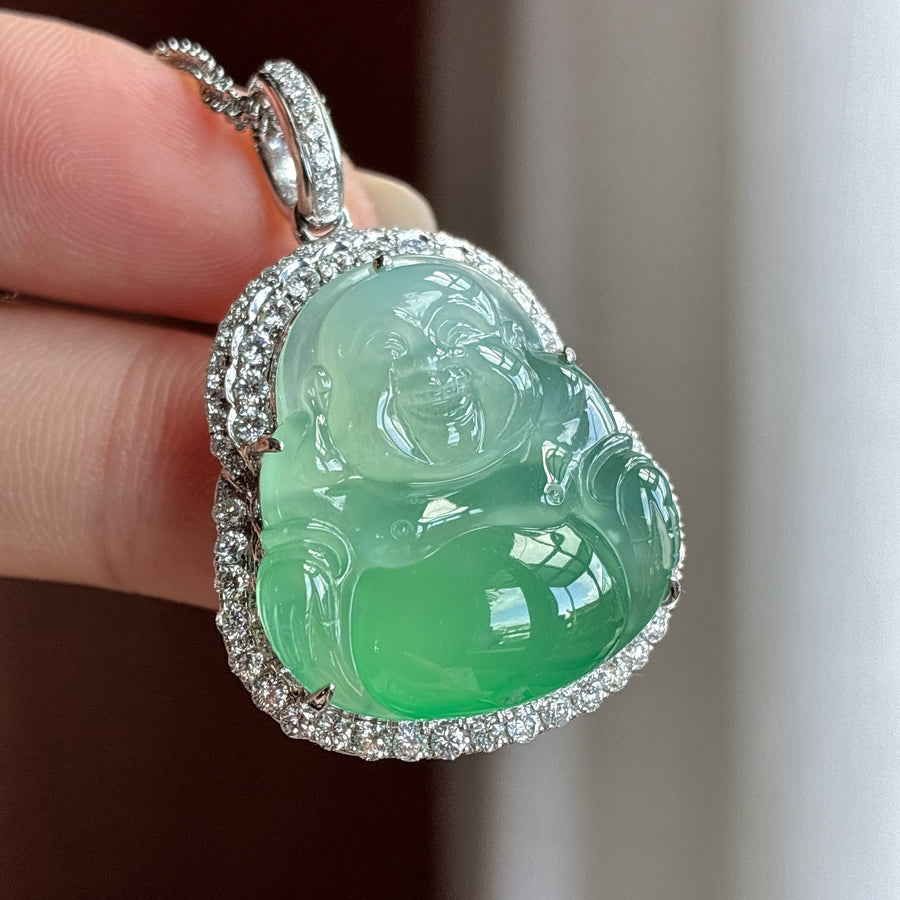 18K gold pendant featuring an icy-variety Buddha figure with natural color.